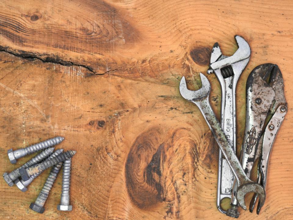 Close-up of maintenance tools on a workbench